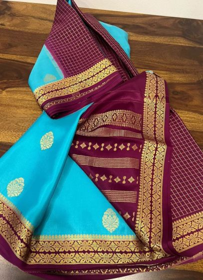 Sky Blue Broad Contrast Border Saree