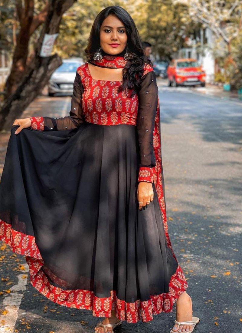 Black gown shop with red dupatta