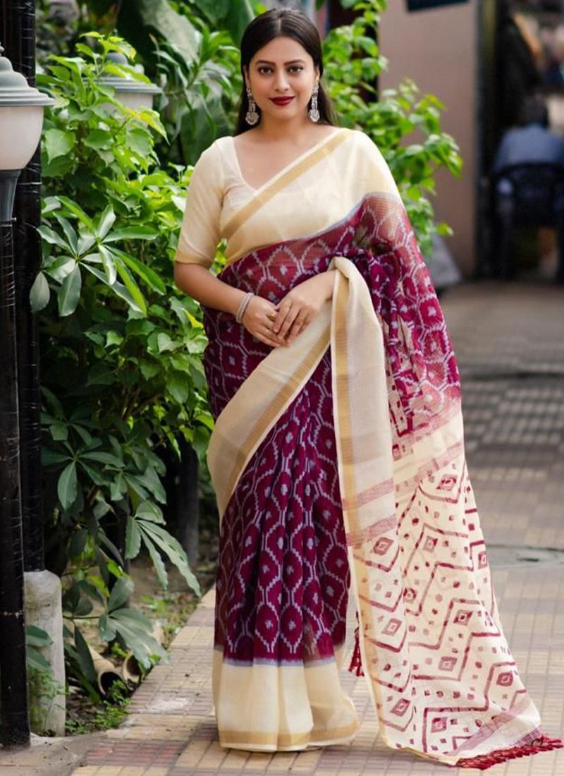 Anupama Parameswaran in a white ikat print saree for 