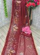 Women Brasso Embroidered Maroon Saree With Unstitched Blouse Piece